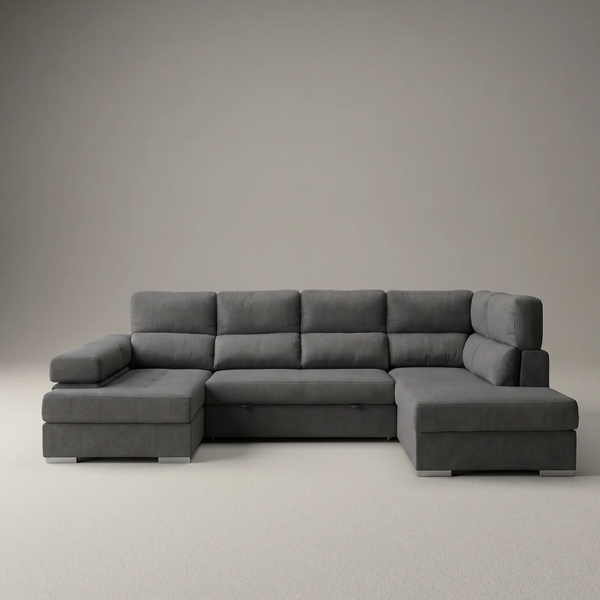 Vista frontal del Sofá Chaiselongue FLORA en gris con chaise longue amplia, reclinables individuales y patas cromadas.